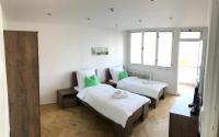 Łóżko lub łóżka w pokoju w obiekcie Apartmán Elizabeth
