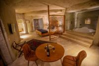 Postel nebo postele na pokoji v ubytování Azure Cave Suites - Cappadocia