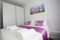 Posteľ alebo postele v izbe v ubytovaní Apartments Romarin