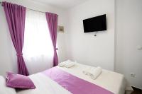 Posteľ alebo postele v izbe v ubytovaní Apartments Romarin