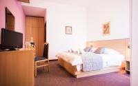Posteľ alebo postele v izbe v ubytovaní Hotel More