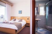 Posteľ alebo postele v izbe v ubytovaní Hotel More