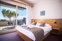 Posteľ alebo postele v izbe v ubytovaní Hotel More