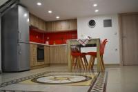 A kitchen or kitchenette at Rodoula Luxury Αpartment 2