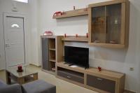 A television and/or entertainment centre at Rodoula Luxury Αpartment 2