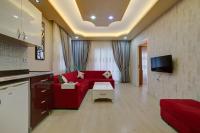 TV a/nebo společenská místnost v ubytování Mersin Vip House Hotel