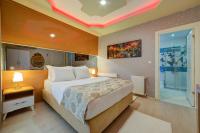 Postel nebo postele na pokoji v ubytování Mersin Vip House Hotel