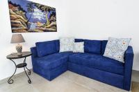 A seating area at Casa vacanze a pochi passi dal mare - AZZURRO DEL MARE -