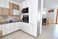 A kitchen or kitchenette at Casa vacanze a pochi passi dal mare - AZZURRO DEL MARE -