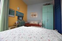 A bed or beds in a room at IL NIDO AL LAGO