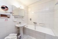 Kúpeľňa v ubytovaní Olympic Suites