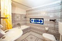 Kúpeľňa v ubytovaní Olympic Suites