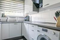 Kuchyň nebo kuchyňský kout v ubytování Private Apartment