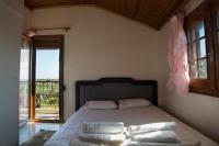 Posteľ alebo postele v izbe v ubytovaní Sunset Villa Sozopoli