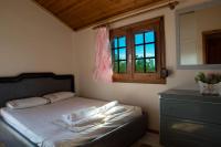 Posteľ alebo postele v izbe v ubytovaní Sunset Villa Sozopoli