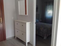 Łóżko lub łóżka w pokoju w obiekcie APARTAMENTO LAS NACIONES 2