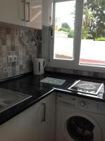 Kuchnia lub aneks kuchenny w obiekcie APARTAMENTO LAS NACIONES 2