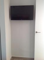 Telewizja i/lub zestaw kina domowego w obiekcie APARTAMENTO LAS NACIONES 2