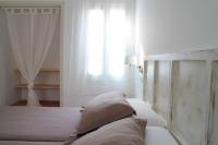 A bed or beds in a room at Es Daus - Formentera Break