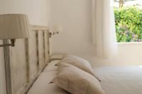 A bed or beds in a room at Es Daus - Formentera Break