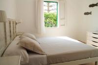 A bed or beds in a room at Es Daus - Formentera Break
