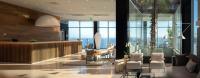 a lobby with chairs and a bar in a building at Hotel Bellevue Dubrovnik in Dubrovnik