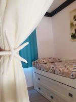 Posteľ alebo postele v izbe v ubytovaní PRECIOSA CASITA JUNTO AL MAR