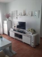 Televízia a/alebo spoločenská miestnosť v ubytovaní APARTAMENTO JUNTO AL MAR EN LA COSTA DE ALMERIA