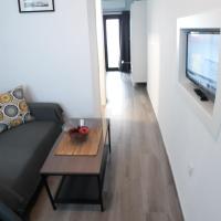 Televízia a/alebo spoločenská miestnosť v ubytovaní Puerta Alameda Suites Mirador Centro Historico