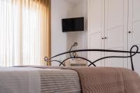 A bed or beds in a room at Casa Grassi