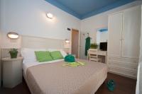 Posteľ alebo postele v izbe v ubytovaní Hotel Fra I Pini