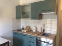 Kuchyň nebo kuchyňský kout v ubytování RIVA Seafront holiday apartments