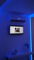 Televízia a/alebo spoločenská miestnosť v ubytovaní Apartamenty Oliwia - Wawrzyńca