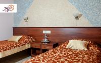 Łóżko lub łóżka w pokoju w obiekcie Hotel Irys