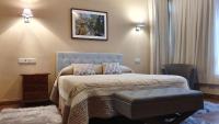 Postel nebo postele na pokoji v ubytování Hotel La Rivera