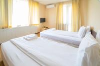 Postel nebo postele na pokoji v ubytování Ring Hotel