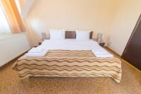 Postel nebo postele na pokoji v ubytování Ring Hotel