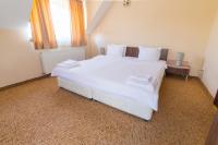 Postel nebo postele na pokoji v ubytování Ring Hotel