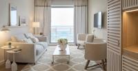 a living room with a couch and chairs and a table at Hotel Bellevue Dubrovnik in Dubrovnik