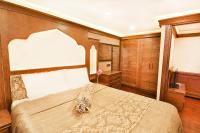 Postel nebo postele na pokoji v ubytování Kumluk Konak Hotel