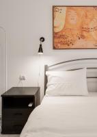 Posteľ alebo postele v izbe v ubytovaní Central Park View Apartment
