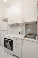 Kuchyňa alebo kuchynka v ubytovaní Central Park View Apartment