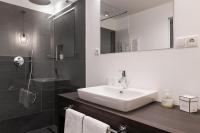 Kúpeľňa v ubytovaní Oliven- & Genusshotel Hirzer