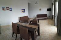 A television and/or entertainment centre at GEOMAR HOUSE 2 SKY AND VIEW