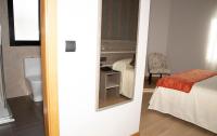 Postel nebo postele na pokoji v ubytování Hotel Mercedes