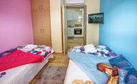 Postel nebo postele na pokoji v ubytování Rent House Karavi