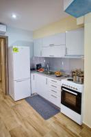 Kuchyň nebo kuchyňský kout v ubytování Rent House Karavi