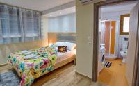 Postel nebo postele na pokoji v ubytování Rent House Karavi