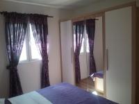 Postel nebo postele na pokoji v ubytování Apartmani PISAC