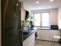 Kuchyňa alebo kuchynka v ubytovaní Apartament Kamienna Gdynia